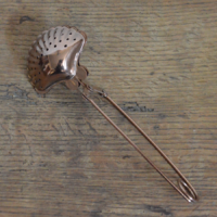 Infuseur Coquillage cuivré